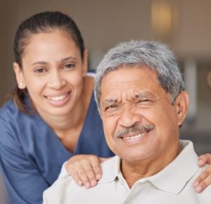 portrait-of-elderly-man-with-a-nurse-bonding-during-a-checkup-at-assisted-living-homecare-smile--r0sx6y9stl0806yxeaq88uphkjlvdcd9fhc3ymha4o